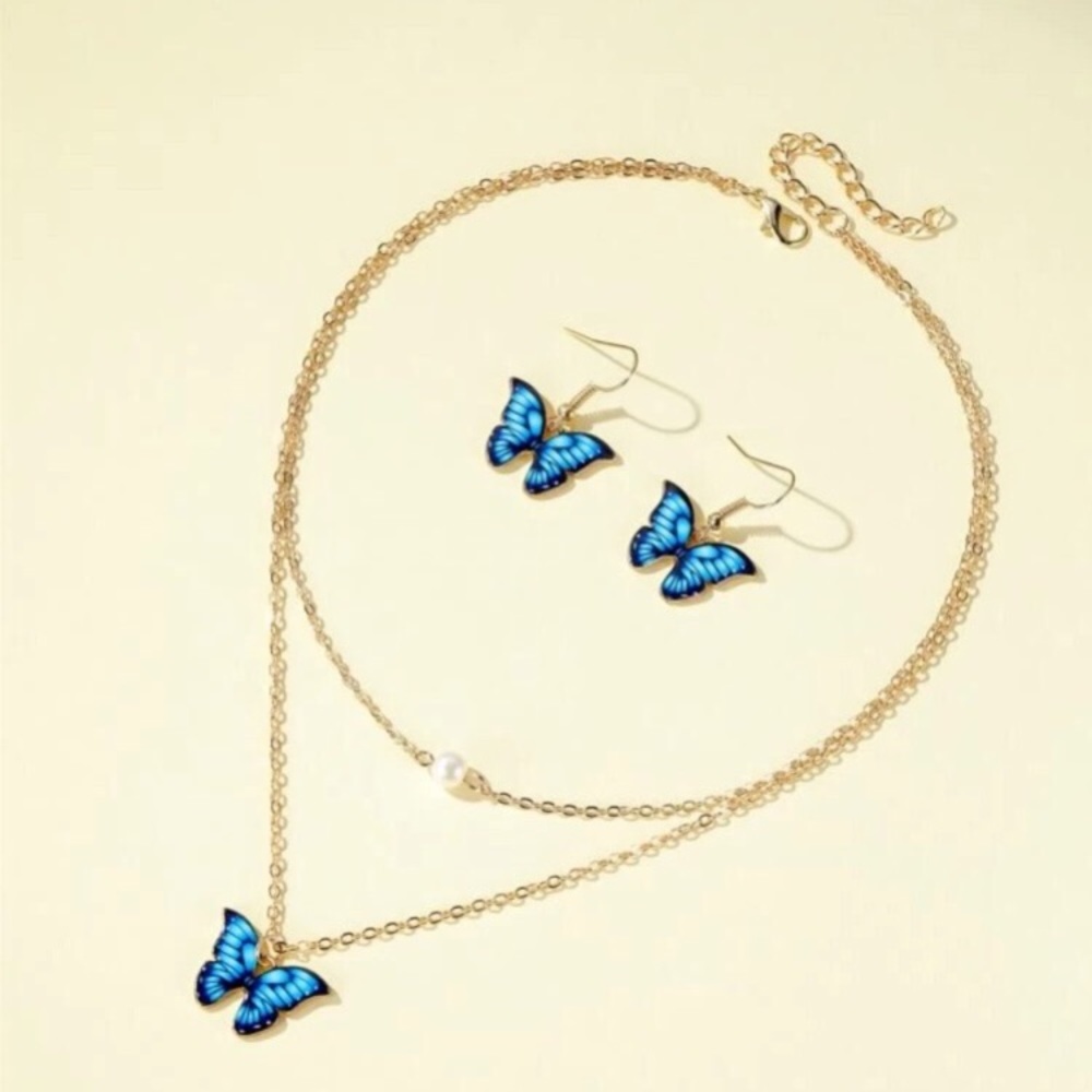 Blue butterfly necklace and earring set